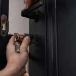 The,Master,Installs,The,Core,For,The,Door,Lock,,Assembly